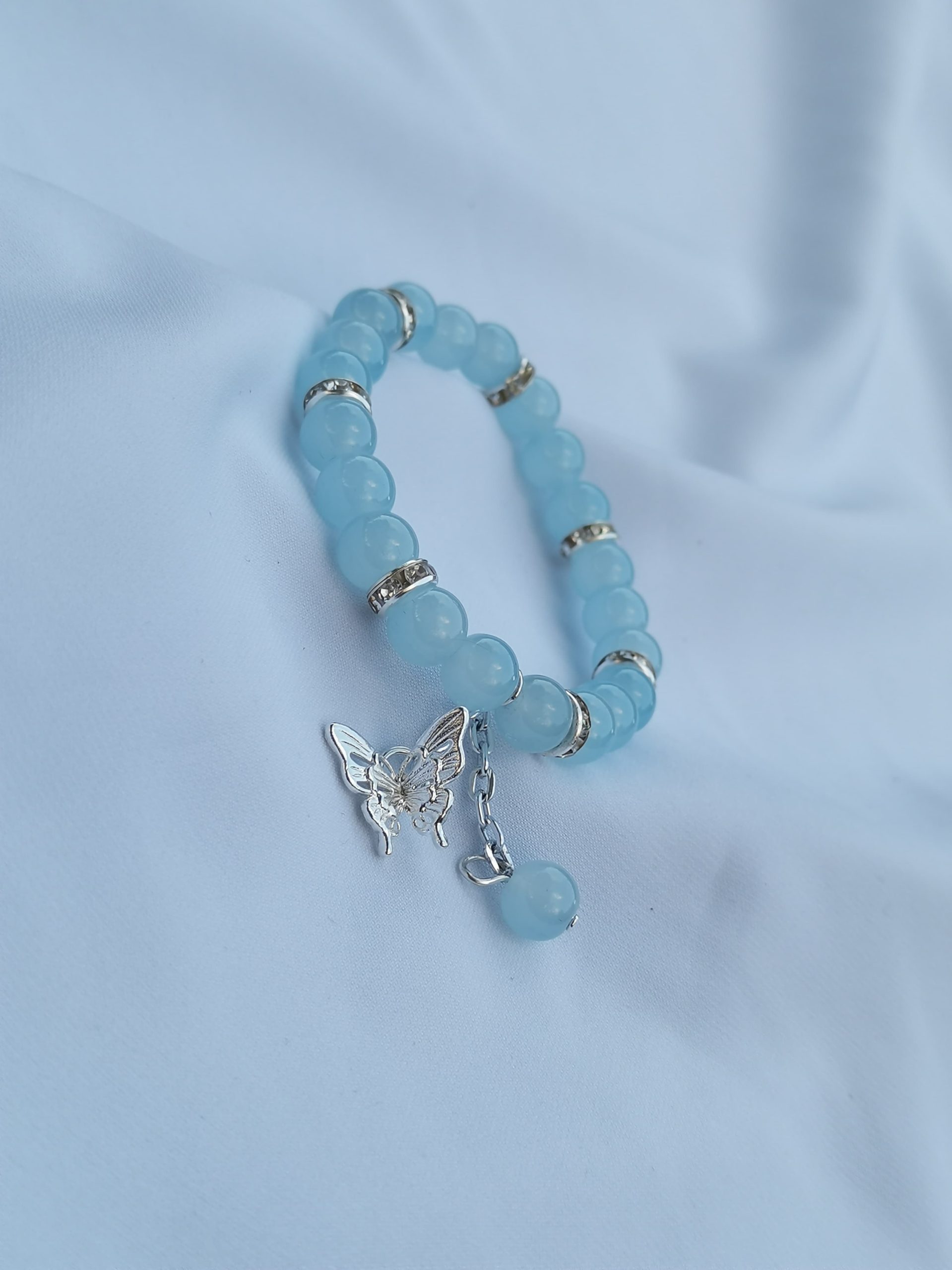 Blue butterfly bracelet with chain ball