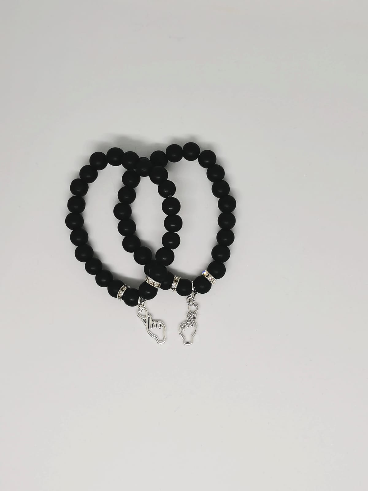 Lava hand heart charm bracelet