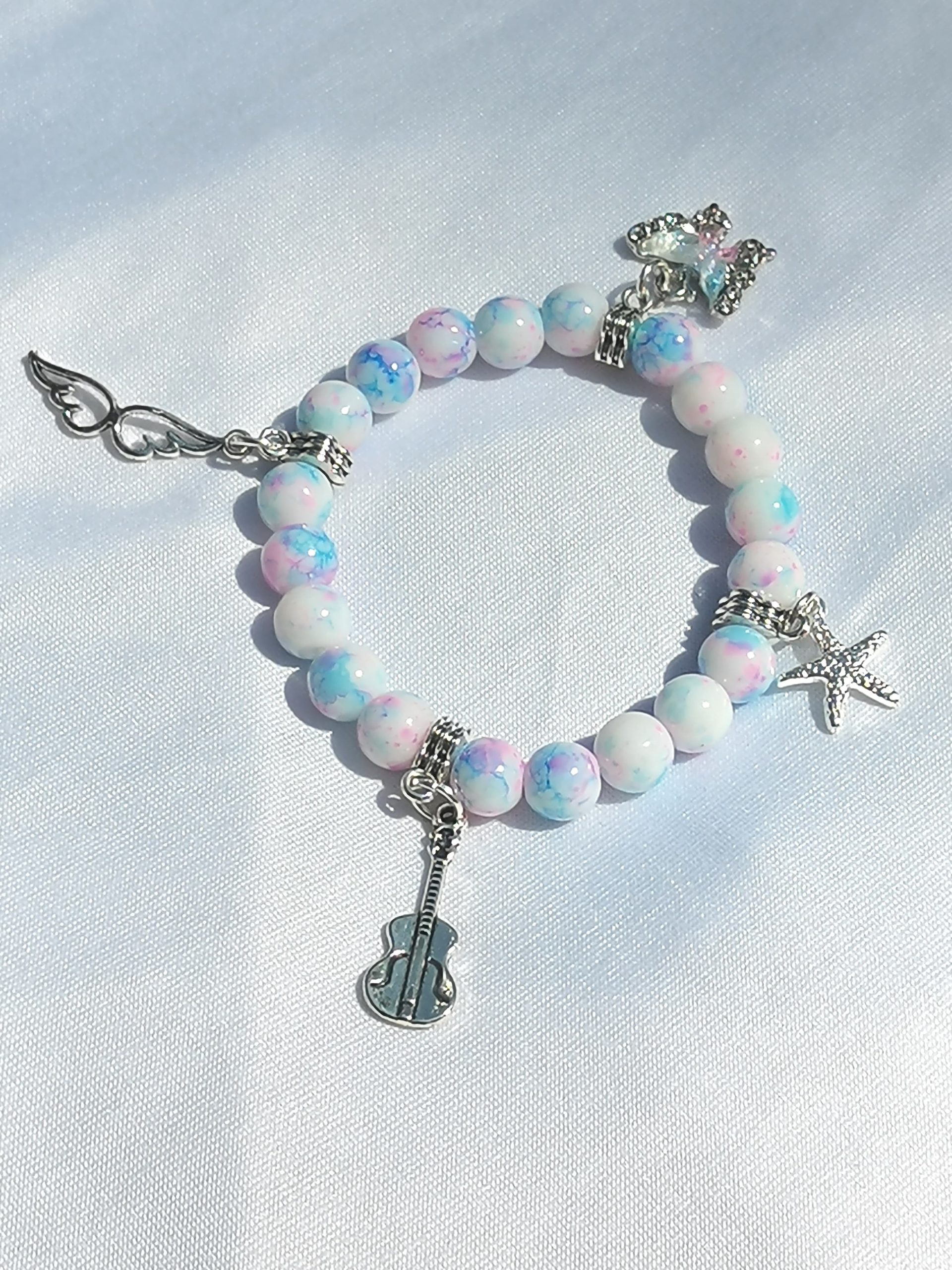 Demon hunter pink, blue, white with charms, elasticated bracelet