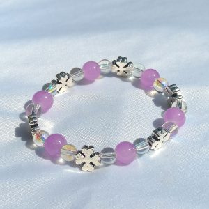Purple, clear two tone and clover spacer elasticated bracelet