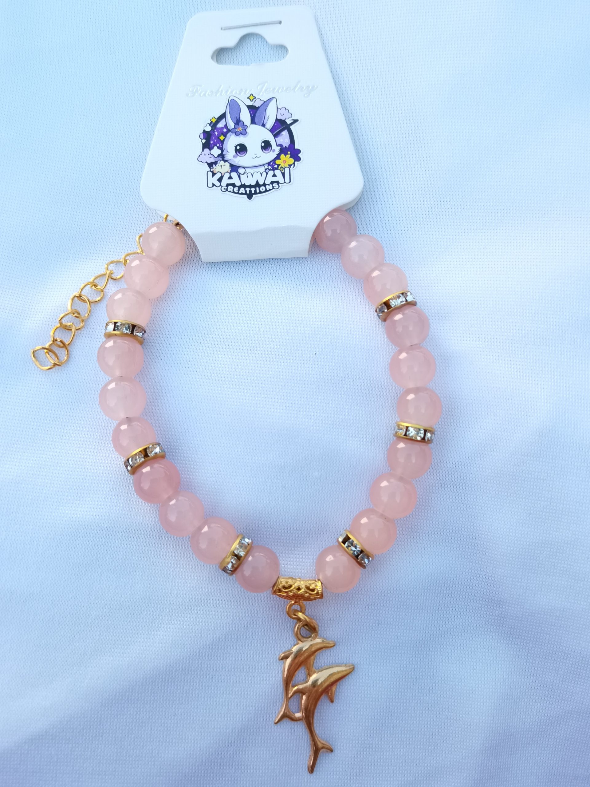 Salmon and gold adjustable bracelet with Dolphine charm
