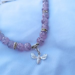 Purple and black adjustable bracelet with silver bee charm