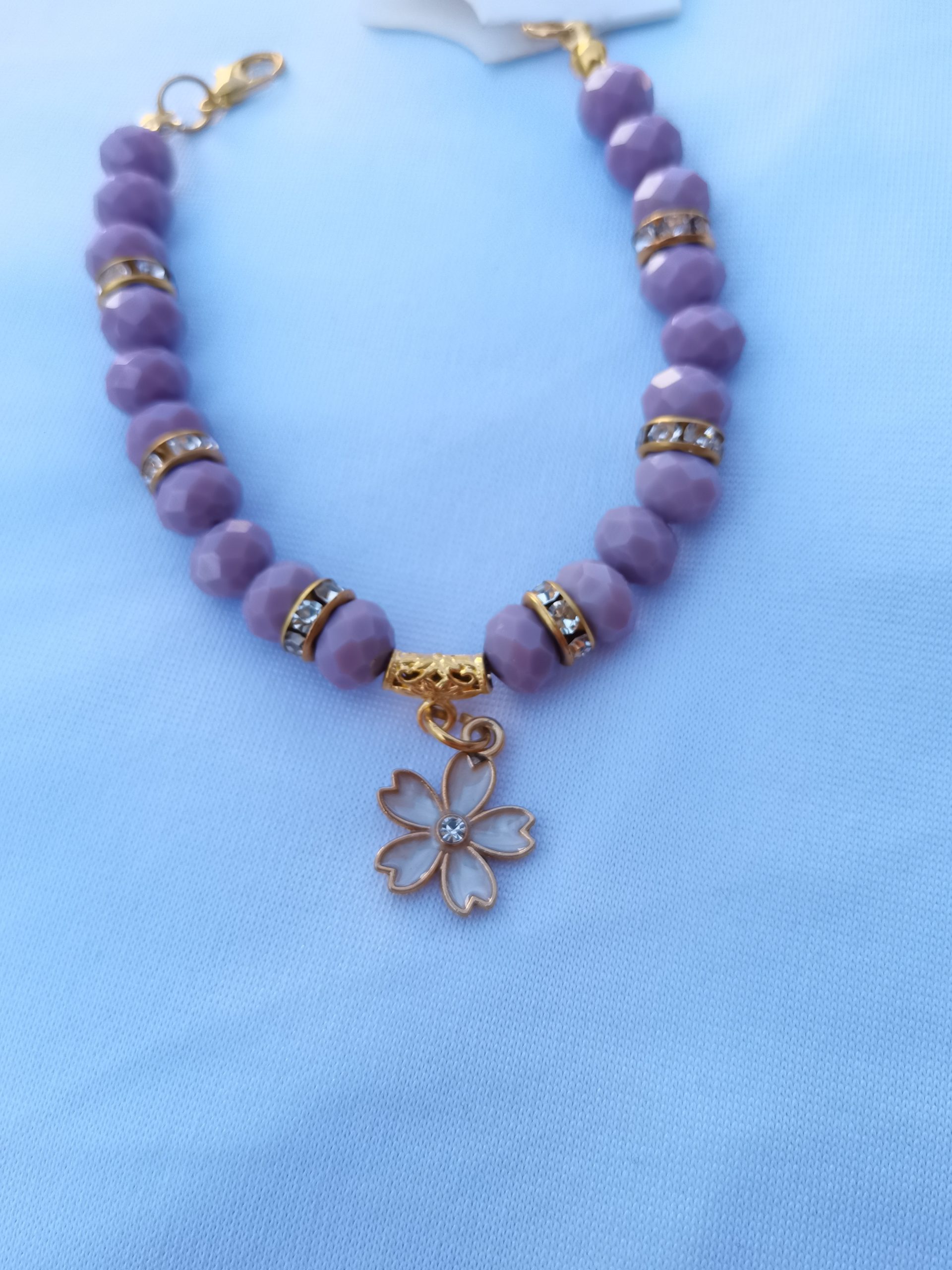 Mink crystal adjustable bracelet with flower charm