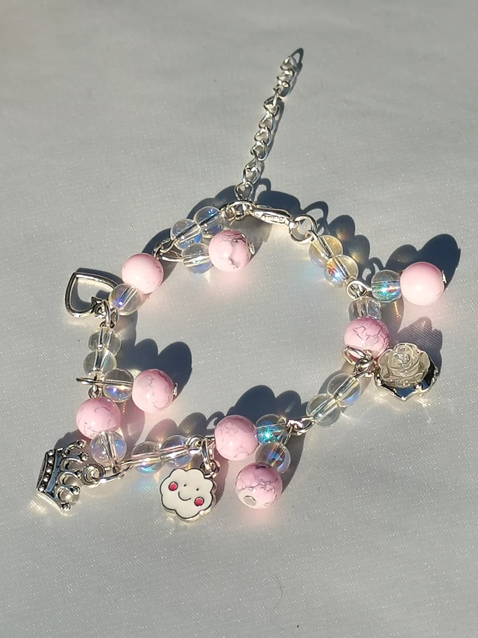 Pink and Silver Chain Bracelet with charms