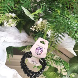 Black and gold elasticated bracelet