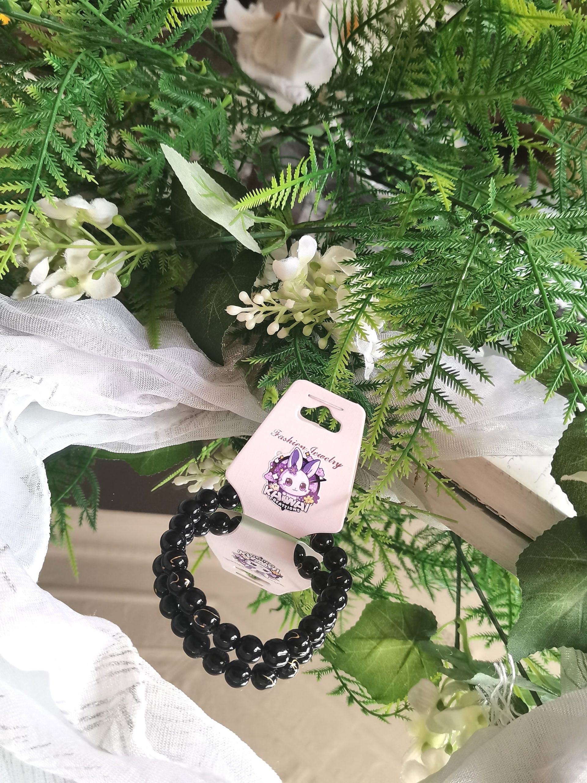 Black and gold elasticated bracelet