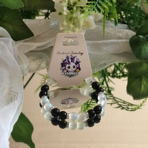 Solid black and frosted bead with silver spacers