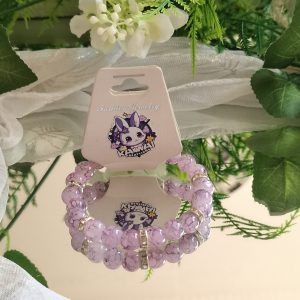Purple and black elasticated bracelet with silver spacers