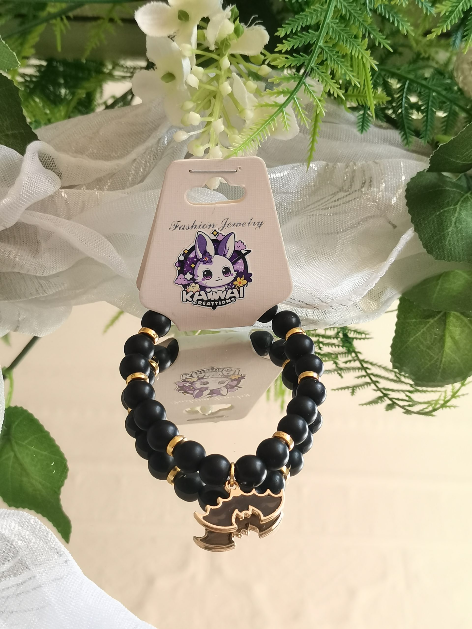 Batman bracelet made with Lava bead and charm