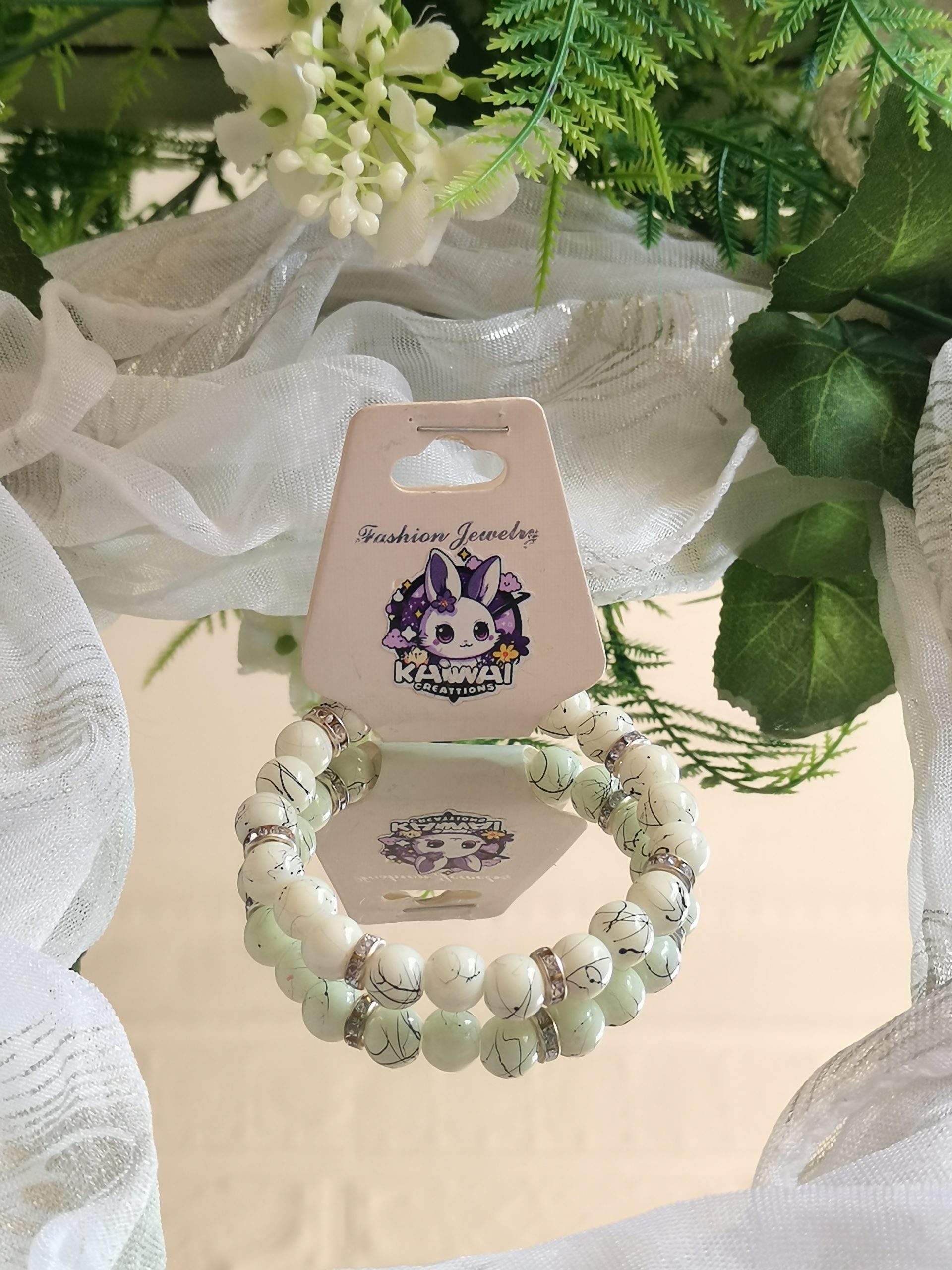 Cream and back bead with silver spacers