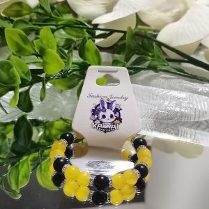 Yellow and Black elasticated bracelet with silver spacers