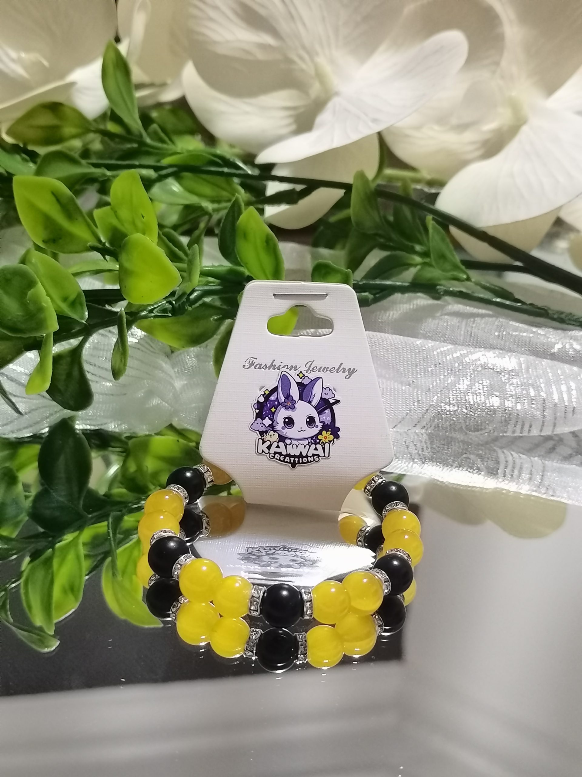 Yellow and Black elasticated bracelet with silver spacers